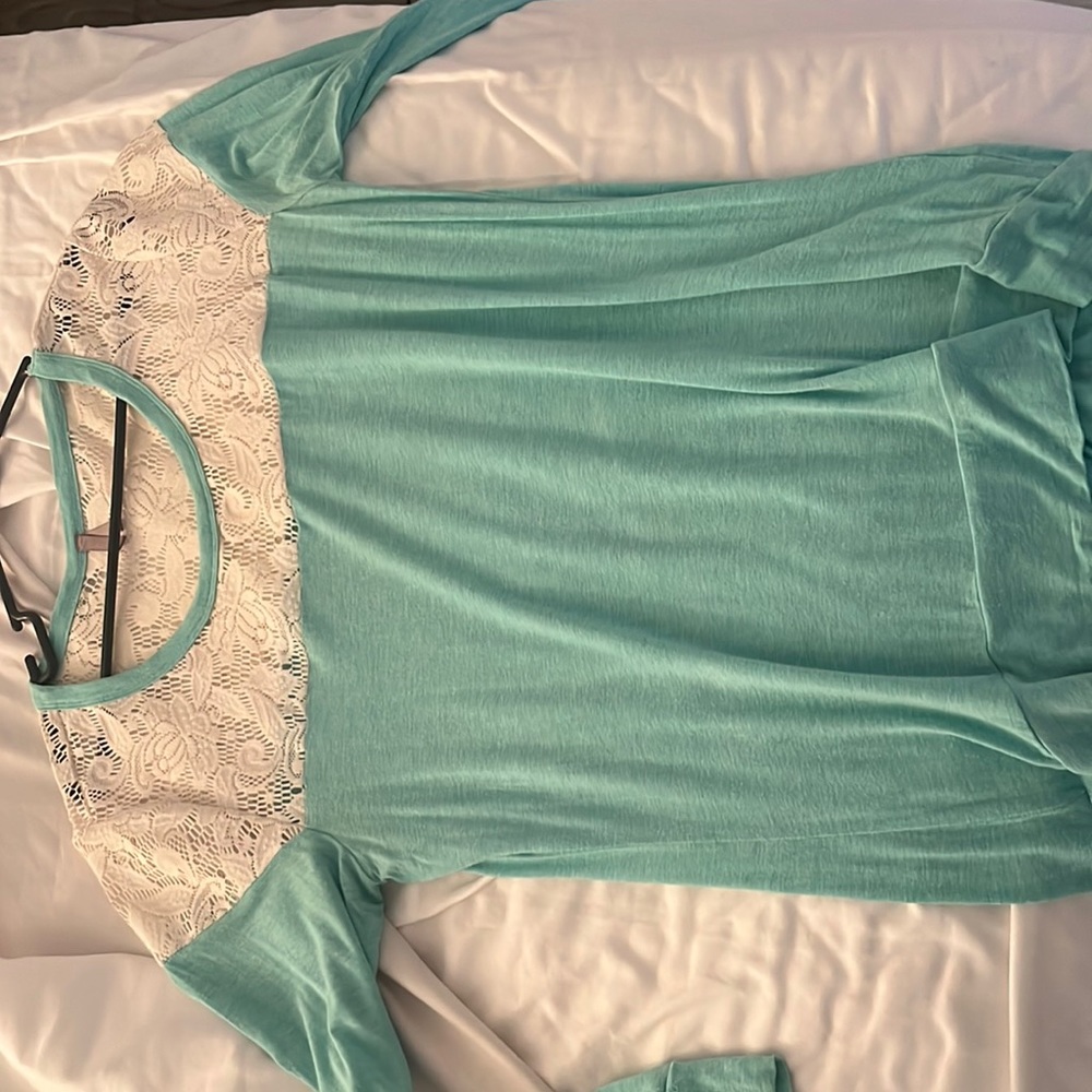 Vanity brand long sleeve shirt. Teal colored with white lace